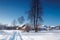 Russian winter village, snow, sun