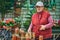 Russian woman selling rolled into cans vegetables (Kaluga region).