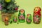 Russian wooden dolls around a Christmas tree