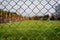 Rust steel net with blur football field