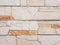 Rust stone wall.Neutral Beige Stone Rock Wall Textured Background