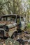 Rusted abandoned bus in forest