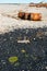 Rusted barrels on the shore, Chukotka.