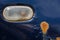 rusted blue car wing with turning lamp close-up with selective focus