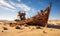 Rusted Boat in the Desert Sands