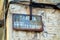 Rusted and Faded Street Sign on Old Building, Nafpaktos, Greece