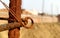 Rusted iron bar on a construction site, sand, bricks. background