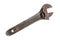 Rusted old adjustable wrench on a white background