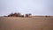 The rusted remains of an abandoned oil drilling rig between Henties Bay and Torra Bay, Skeleton Coast, Namibia.