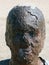 Rusted statue head