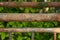 Rusted tubular metal fence close up detail shot shallow depth of field