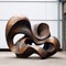 Rustic Abstraction: A Swirling Metal Sculpture Inspired By Henry Moore And Karl Blossfeldt