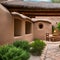 A rustic adobe with a courtyard, a kiva fireplace, and a pueblo-style design3, Generative AI
