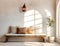 Rustic aged wood log bench near beige stucco wall. Boho interior design of modern living room with arched window in farmhouse.