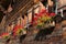 Rustic ancient wooden house with flowers