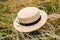 Rustic background. Nature background with straw boater hat and wild nature