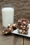 Rustic background with rocky road dessert squares with glass of