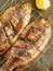 Rustic barbecued grilled fish