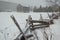 Rustic barn and fence in winter