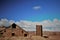 Rustic barn and water tower, snow capped mountain back ground