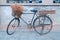 Rustic bike near the wall of an old building in Xinan City Memory Park, Shijingshan, Beijing, China