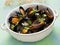 Rustic black mussel in garlic white wine sauce