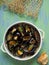 Rustic black mussel in garlic white wine sauce