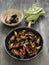 Rustic black mussel in tomato sauce