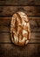 Rustic bread on an old vintage planked wood table