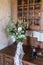 Rustic bridal bouquet on a wooden cupboard