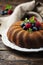 Rustic bundt cake with berries and mint