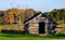 Rustic cabin in field