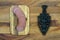 Rustic cast iron and sausage with wooden background