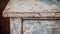 Rustic Charm: Close-up Of Cracked Wooden Table In Indigo And Beige