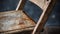 Rustic Charm: Close-up Of Vintage Silk Folding Chair