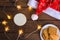 Rustic Christmas background with milk and cookies to Santa. Copy space.