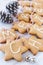 Rustic christmas decorations with cookies, pine cones and bells