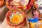 Rustic colorfully painted wooden bowls in traditional market