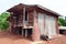 This rustic corrugated tin and wood building serves as a chicken coop in north central Thailand.