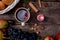 Rustic cozy still life: cup of tea, fruits, vegetables, hazelnuts and cinnamon sticks top view. Autumn aesthetic still
