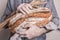 Rustic crusty loaf of bread in baker man`s hands