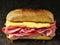 Rustic deli cold cuts sandwich