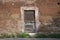 Rustic Door in Ancient Wall