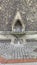 Rustic drinking fountain for man and beast in Reading town center, England