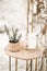 Rustic, eco and boho wedding in the desert canyon with decor. Candles, succulents, golden stands, decorations in rustic