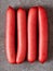 Rustic english saveloy red pork sausage