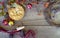 Rustic fall decor and apple pie on wood plank background