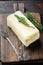 Rustic farmhouse inspired butter, on old dark  wooden table background