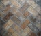 Rustic floor texture made of bricks. House interior tiles.