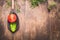 Rustic food background for cooking or recipes with wooden spoon , basil leaf and tomato, top view.